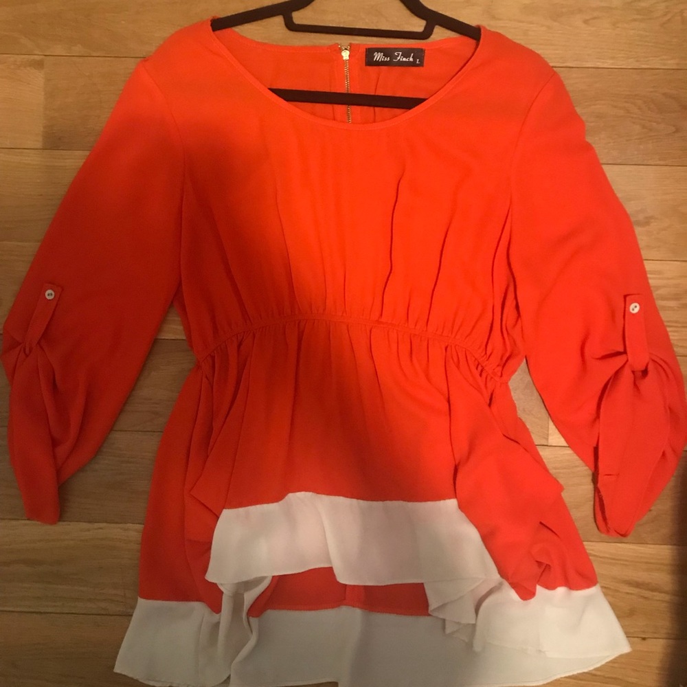 Orange blouse that sinches at the waist